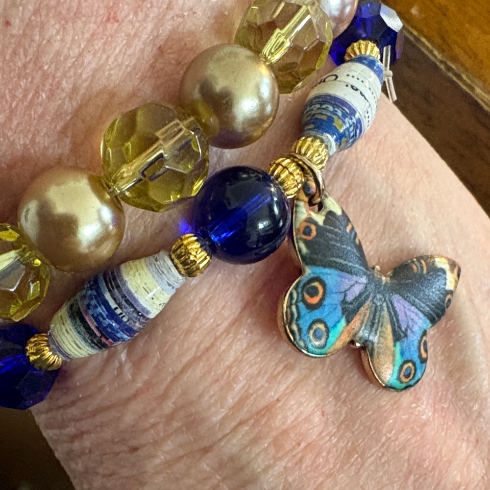 Artisan Multicolor Beaded Bracelet with Butterfly Charm
